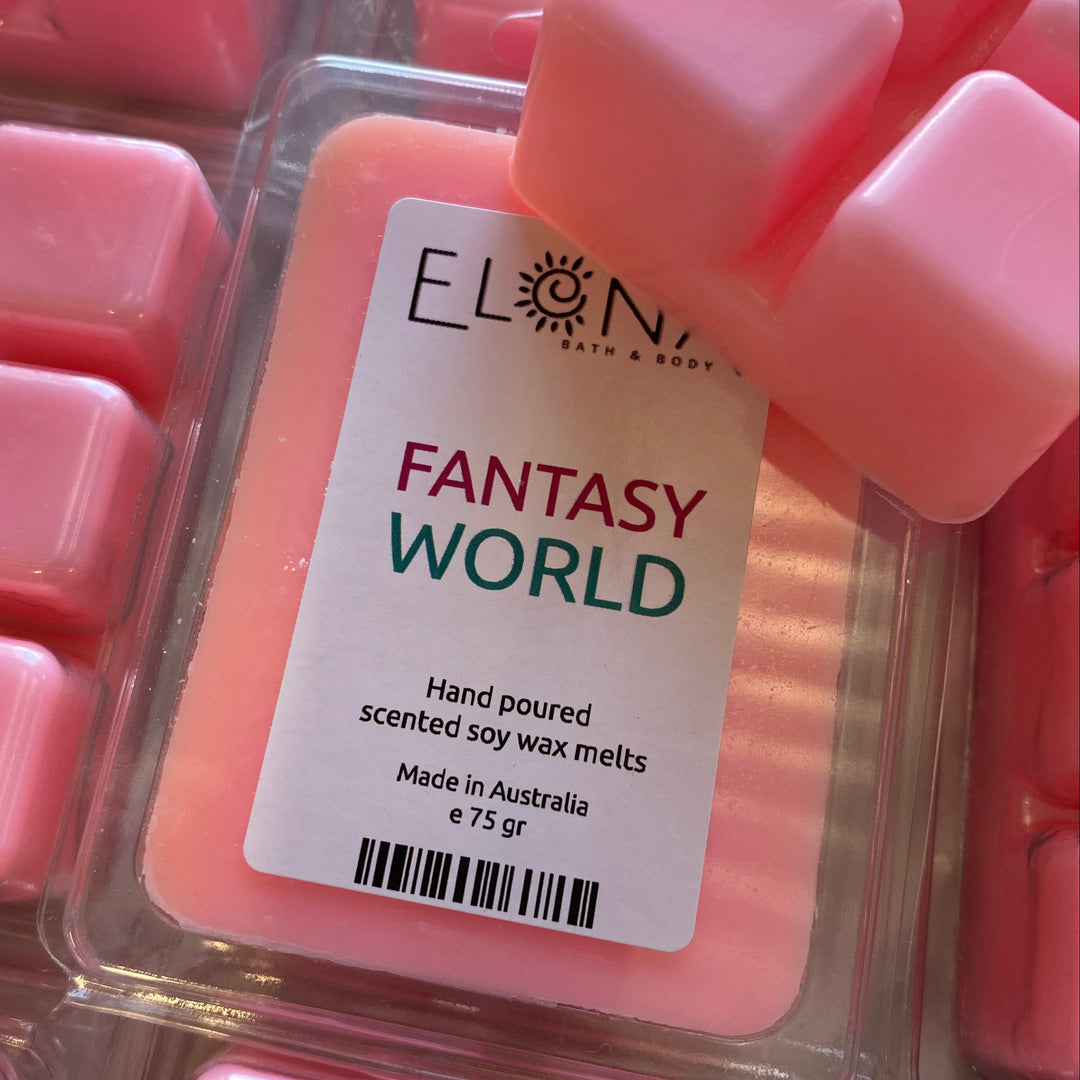 Pink wax melts in a container with an Elon Musk branded label.