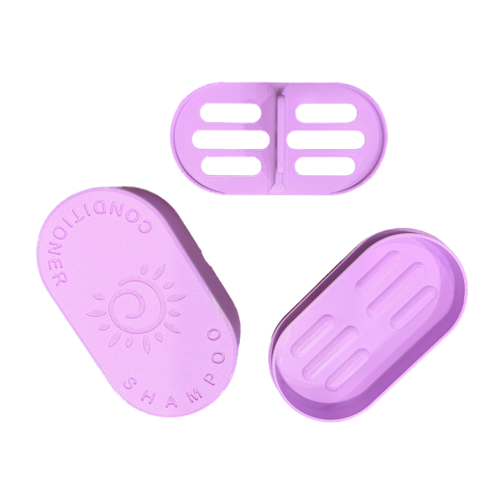 Lilac Shampoo and Conditioner Bar Travel Case shown open with the sun embossed lid, base and draining insert