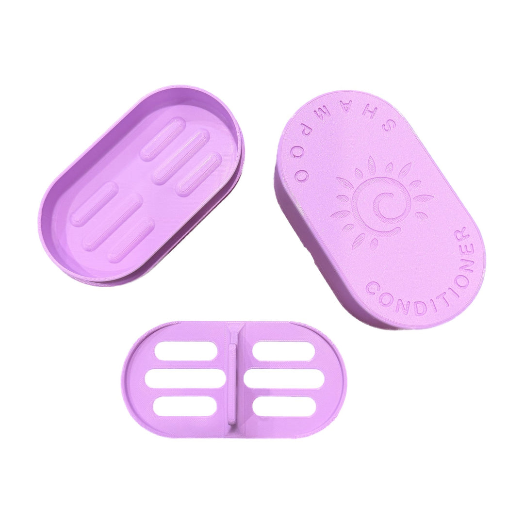 Lilac Shampoo and Conditioner Bar Travel Case shown open with the sun embossed lid, base and draining insert