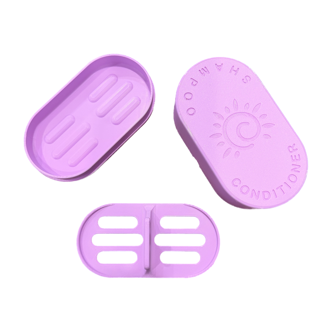 Lilac Shampoo and Conditioner Bar Travel Case shown open with the sun embossed lid, base and draining insert