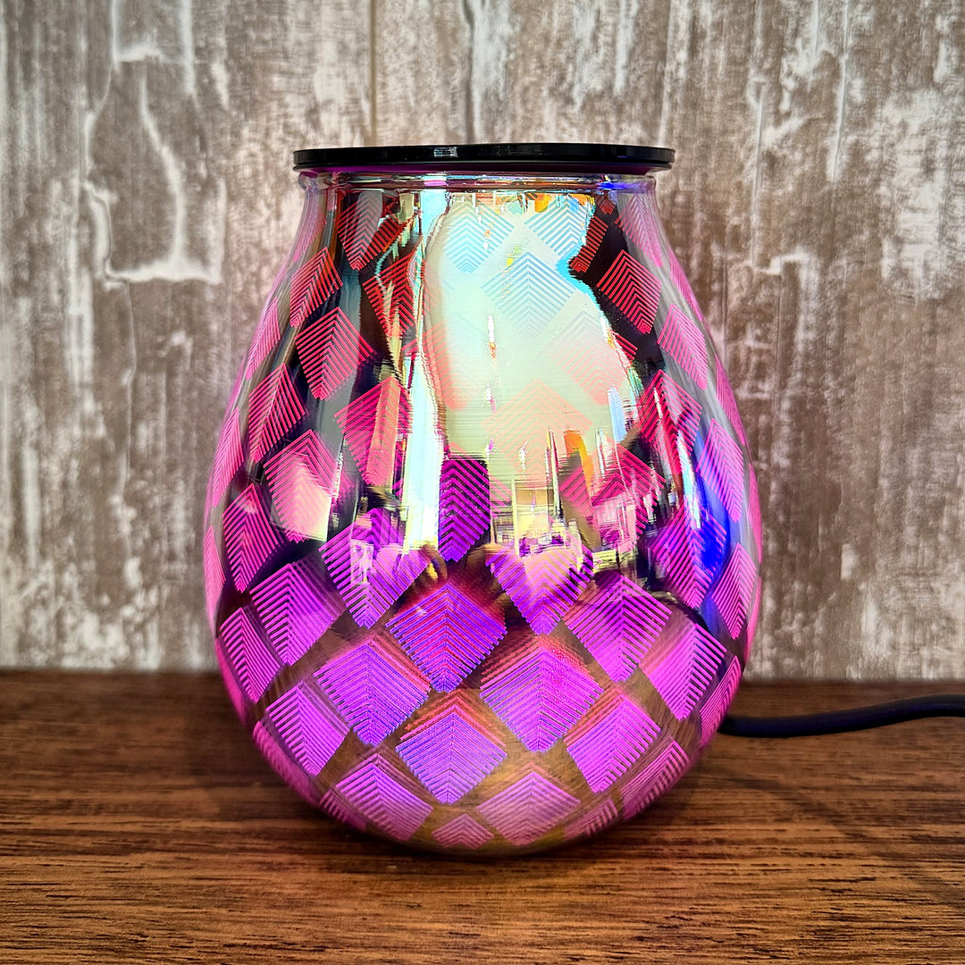 Seraphina glass wax warmer glowing pink