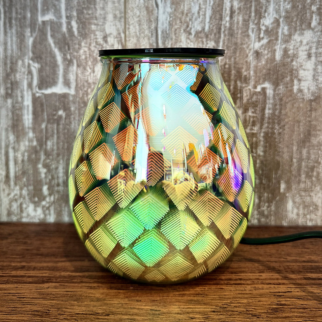 Seraphina glass wax warmer glowing green and gold