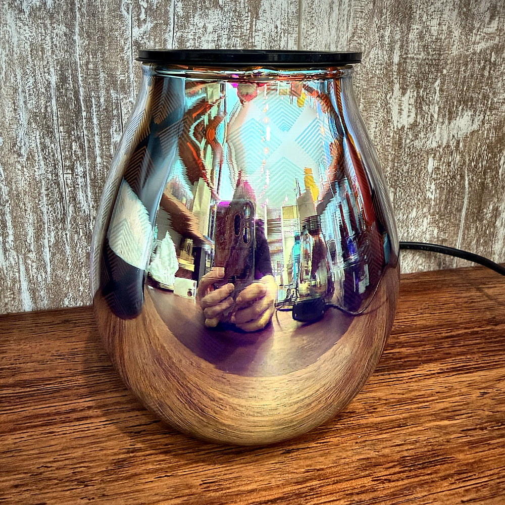Seraphina glass wax warmer switched off, mirror finish reflecting the room