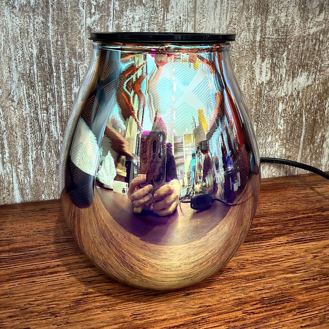 Seraphina glass wax warmer switched off, mirror finish reflecting the room