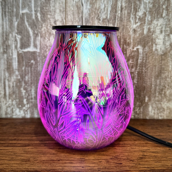 Twilight glass wax warmer glowing pink