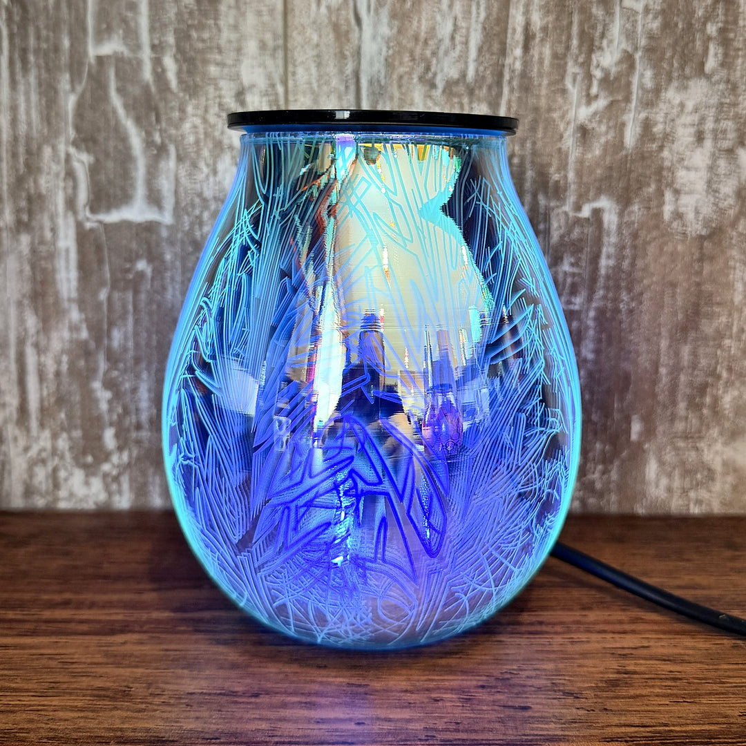 Twilight glass wax warmer glowing blue
